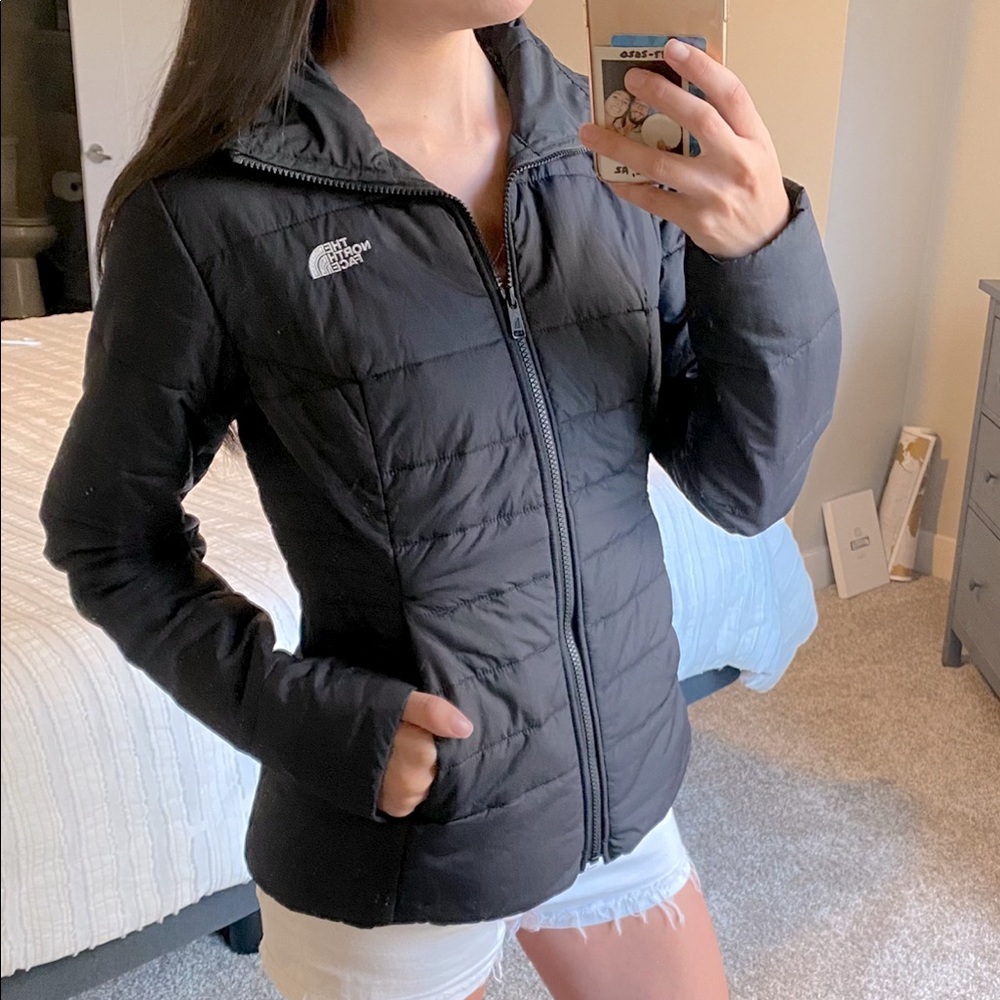 The North Face thin puffy jacket.